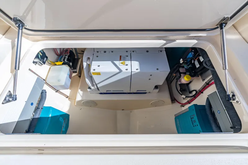  Yacht Photos Pics 2021 Scout 380 LXF engine compartment showcasing advanced marine equipment.