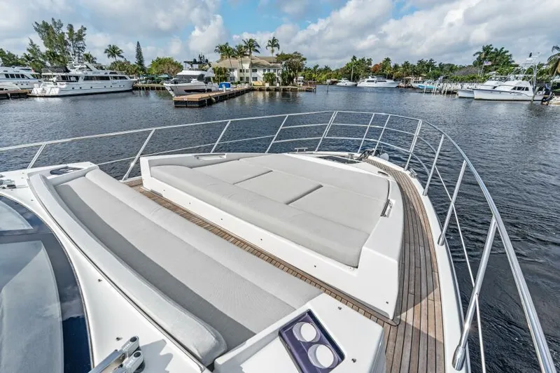 Blessed Yacht Photos Pics 2020 Azimut S6 yacht with spacious deck in a marina setting.