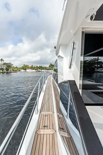 Blessed Yacht Photos Pics 2020 Azimut S6 yacht deck with sleek design and waterfront view.