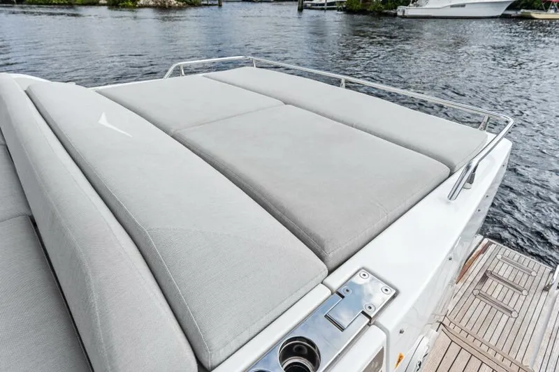 Blessed Yacht Photos Pics 2020 Azimut S6 yacht sunbed on deck by the water.