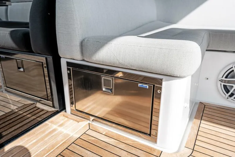 Blessed Yacht Photos Pics 2020 Azimut S6 yacht interior with sleek seating and stainless steel storage.