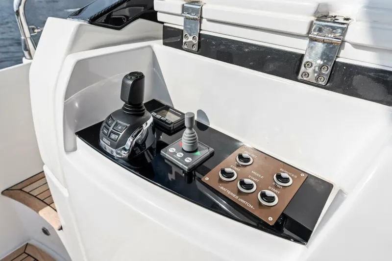 Blessed Yacht Photos Pics Control panel of a 2020 Azimut S6 yacht with joystick and switches.