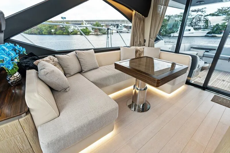 Blessed Yacht Photos Pics Luxurious interior of 2020 Azimut S6 yacht with elegant seating and modern decor.
