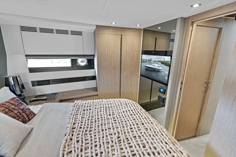 Blessed Yacht Photos Pics Interior of 2020 Azimut S6 yacht bedroom with modern design and natural light.