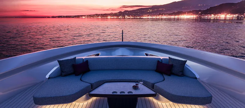 X106 Fast Yacht Photos Pics Luxurious Extra X 106 FAST yacht deck at sunset, 2026 model, with scenic ocean view.