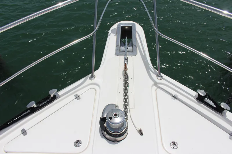  Yacht Photos Pics Bow of 2005 Riviera 51 Flybridge yacht with anchor chain and windlass.