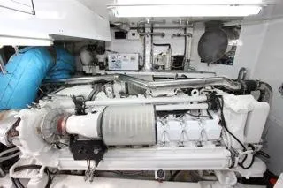 Mabel Yacht Photos Pics 2001 Precision Convertible engine room with detailed machinery and piping.