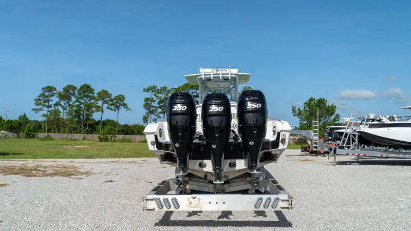  Yacht Photos Pics 2007 Fountain 38TE Cuddy Cabin with triple 350 horsepower engines on a trailer.