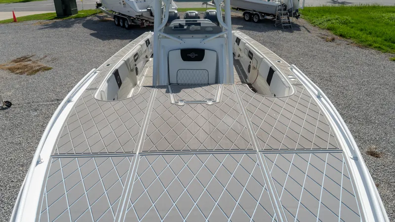  Yacht Photos Pics 2007 Fountain 38TE Cuddy Cabin boat with spacious deck and modern design.