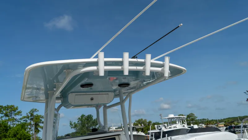  Yacht Photos Pics 2007 Fountain 38TE Cuddy Cabin boat with rod holders and antennas.