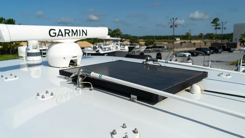  Yacht Photos Pics Close-up of 2007 Fountain 38TE Cuddy Cabin boat with Garmin radar and solar panel.