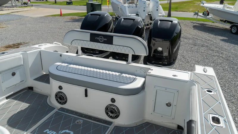  Yacht Photos Pics 2007 Fountain 38TE Cuddy Cabin boat with triple outboard engines.