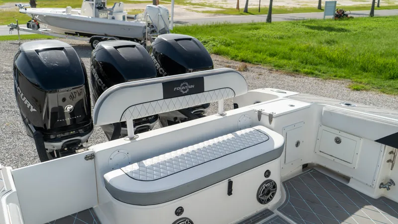  Yacht Photos Pics 2007 Fountain 38TE Cuddy Cabin with triple Mercury outboard engines.