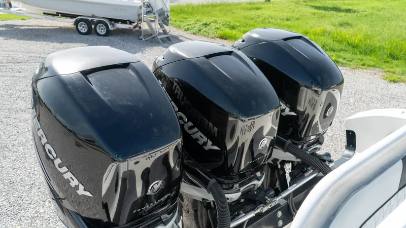  Yacht Photos Pics Triple Mercury outboard engines on a 2007 Fountain 38TE Cuddy Cabin boat.