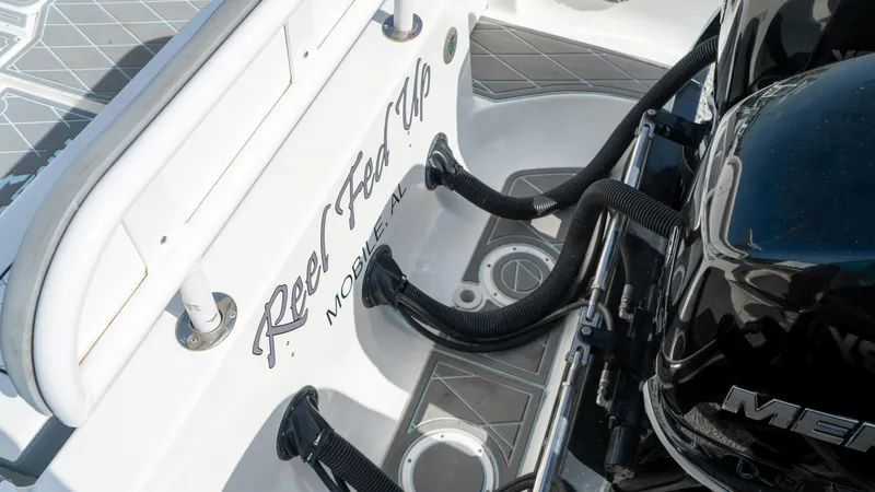  Yacht Photos Pics 2007 Fountain 38TE Cuddy Cabin boat deck with Mercury engine.