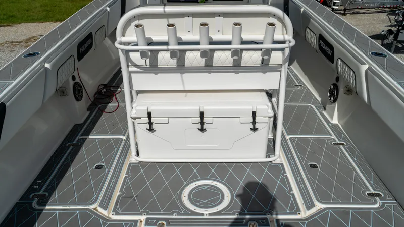  Yacht Photos Pics 2007 Fountain 38TE Cuddy Cabin boat deck with rod holders and storage.