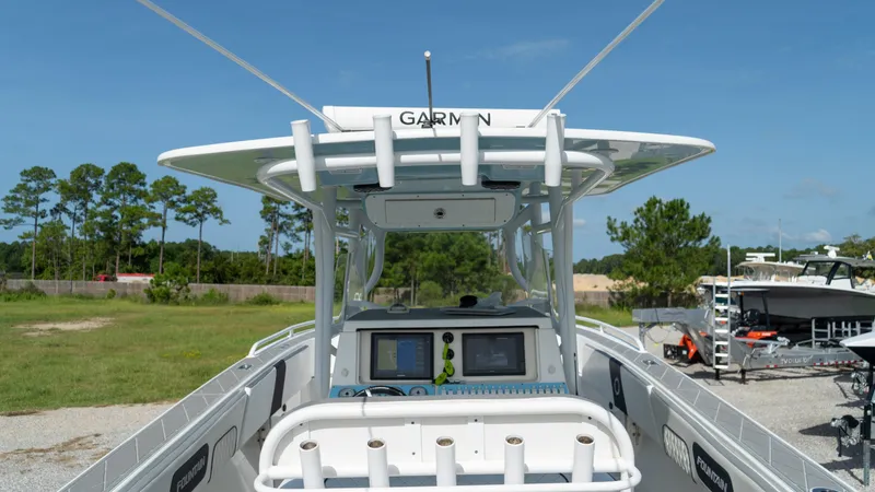  Yacht Photos Pics 2007 Fountain 38TE Cuddy Cabin boat with Garmin navigation system.