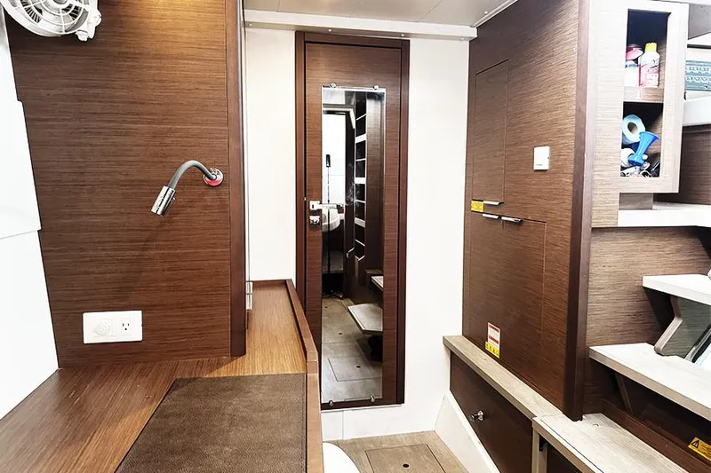 Coquina Yacht Photos Pics Interior of 2019 Lagoon 40 yacht with wooden finish and modern amenities.