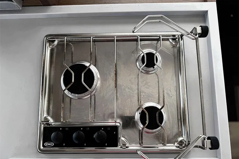 Coquina Yacht Photos Pics Stainless steel three-burner stove on a 2019 Lagoon 40 yacht.