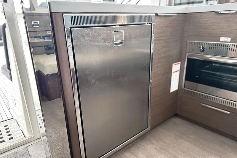 Coquina Yacht Photos Pics Modern kitchen area in a 2019 Lagoon 40 yacht with stainless steel appliances.