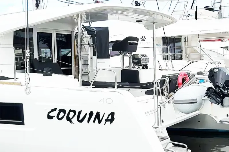 Coquina Yacht Photos Pics 2019 Lagoon 40 catamaran named Coquina docked at a marina.