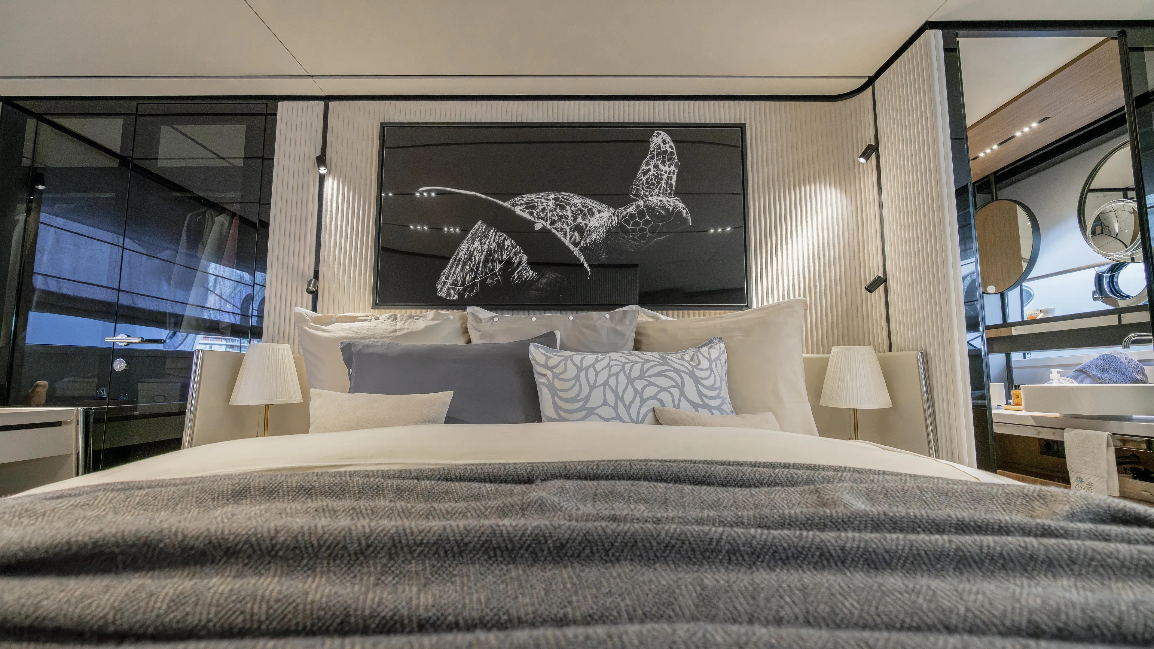  Yacht Photos Pics Luxurious bedroom interior of 2022 Ferretti Yachts 720, featuring elegant decor and modern design.