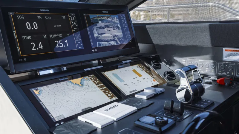  Yacht Photos Pics Ferretti Yachts 720 cockpit with advanced navigation displays and controls, 2022 model.