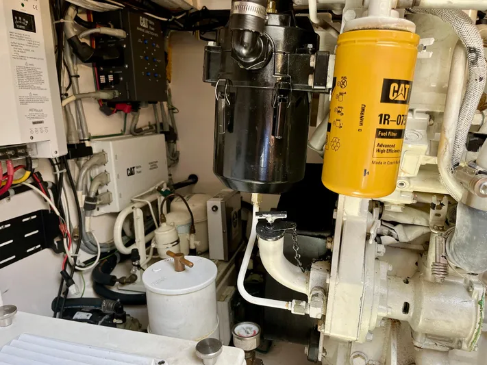  Yacht Photos Pics Engine room of a 2004 Cabo 35 Express with CAT fuel filter system.