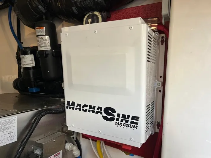  Yacht Photos Pics Magnum Energy inverter in 2004 Cabo 35 Express boat engine room.