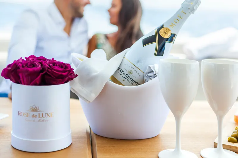 Salacia Yacht Photos Pics Romantic yacht setting with champagne, roses, and glasses on a Sirena 64, 2019.