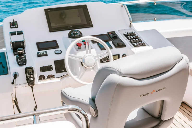 Salacia Yacht Photos Pics Helm of 2019 Sirena 64 yacht with modern controls and navigation equipment.