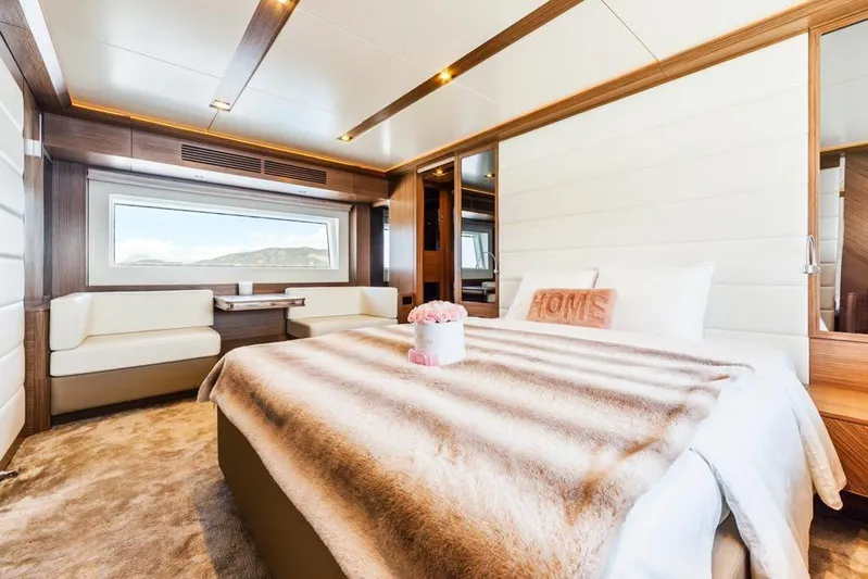 Salacia Yacht Photos Pics Luxurious 2019 Sirena 64 yacht bedroom with elegant decor and scenic window view.