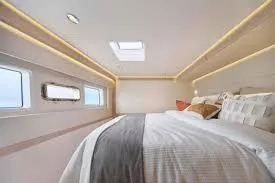  Yacht Photos Pics Luxurious bedroom interior of 2025 Heysea Seaview 59 yacht with modern design.