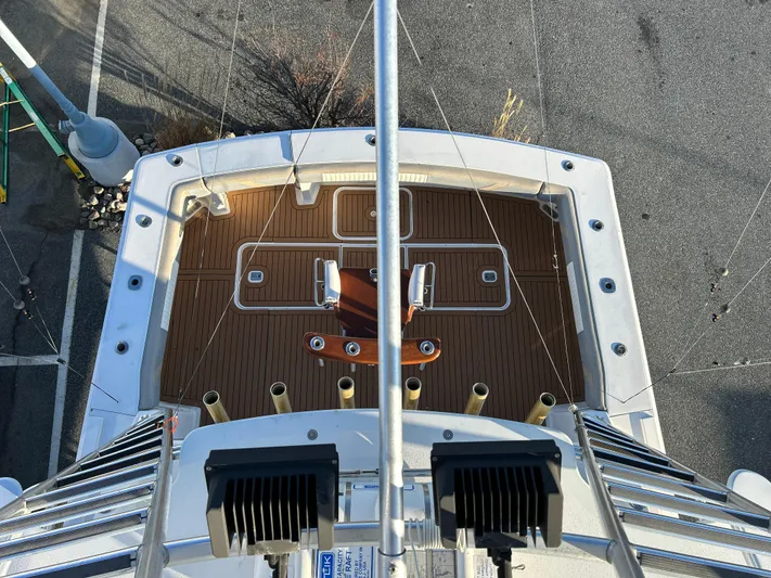 Bad Habit Yacht Photos Pics Aerial view of 1997 Viking 43 Open yacht deck with wooden flooring.