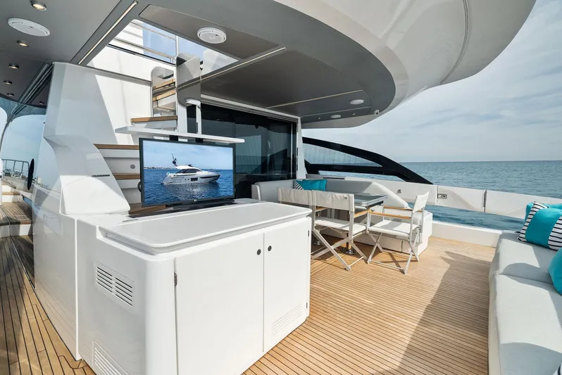 Ocean's Se7en Yacht Photos Pics Luxurious 2022 Azimut S8 yacht deck with modern seating and ocean view.