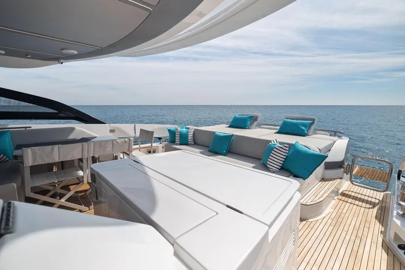 Ocean's Se7en Yacht Photos Pics Luxury deck of 2022 Azimut S8 yacht with ocean view and plush seating.