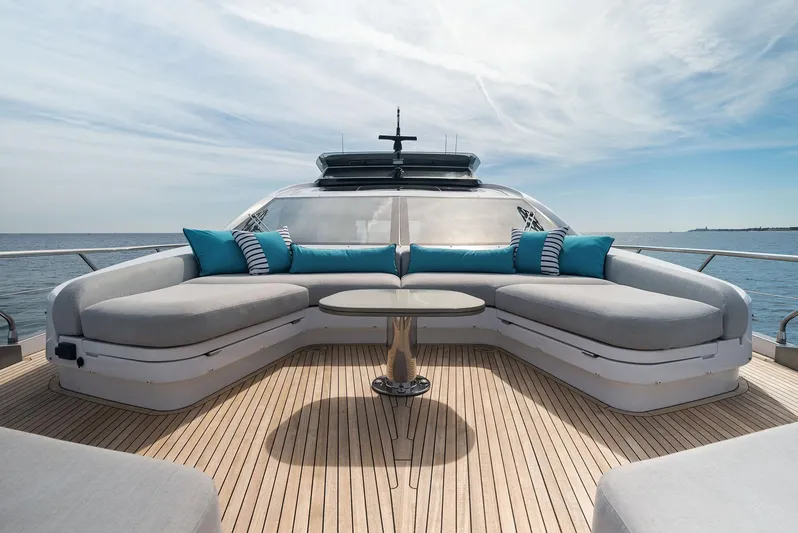 Ocean's Se7en Yacht Photos Pics Luxurious 2022 Azimut S8 yacht deck with elegant seating and ocean view.