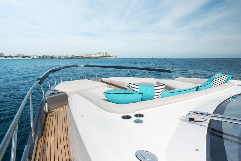 Ocean's Se7en Yacht Photos Pics 2022 Azimut S8 yacht deck with luxurious seating, overlooking serene ocean waters.