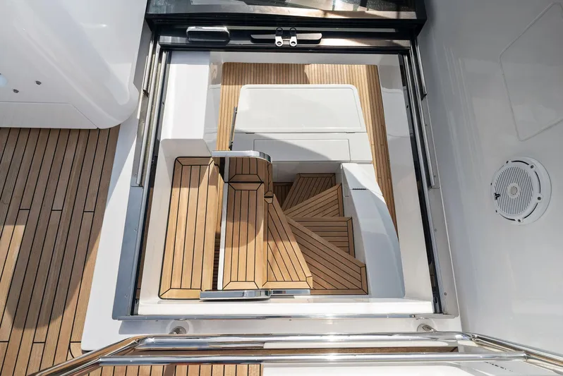 Ocean's Se7en Yacht Photos Pics 2022 Azimut S8 yacht interior with elegant wooden staircase and modern design.
