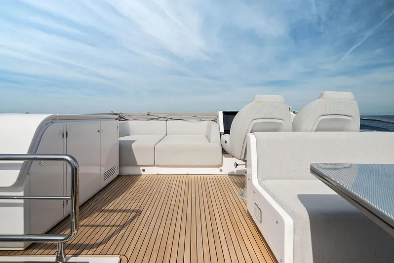 Ocean's Se7en Yacht Photos Pics Luxurious 2022 Azimut S8 yacht deck with elegant seating and sleek design.