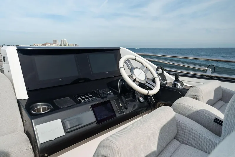 Ocean's Se7en Yacht Photos Pics 2022 Azimut S8 yacht helm with modern controls and ocean view.