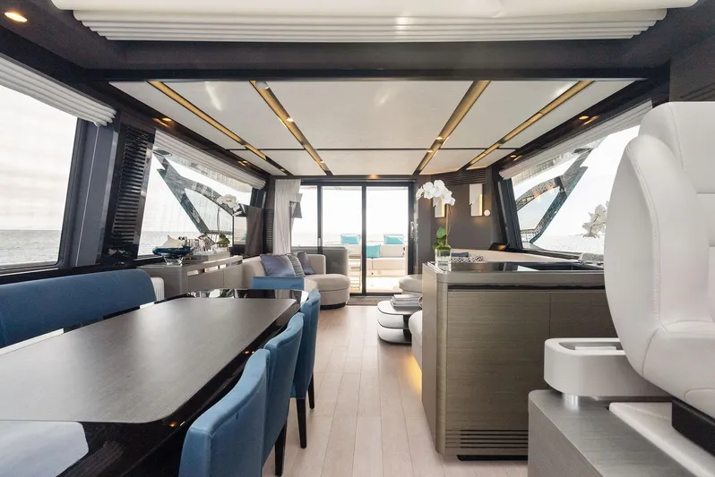 Ocean's Se7en Yacht Photos Pics Luxurious interior of 2022 Azimut S8 yacht, featuring elegant seating and modern design elements.
