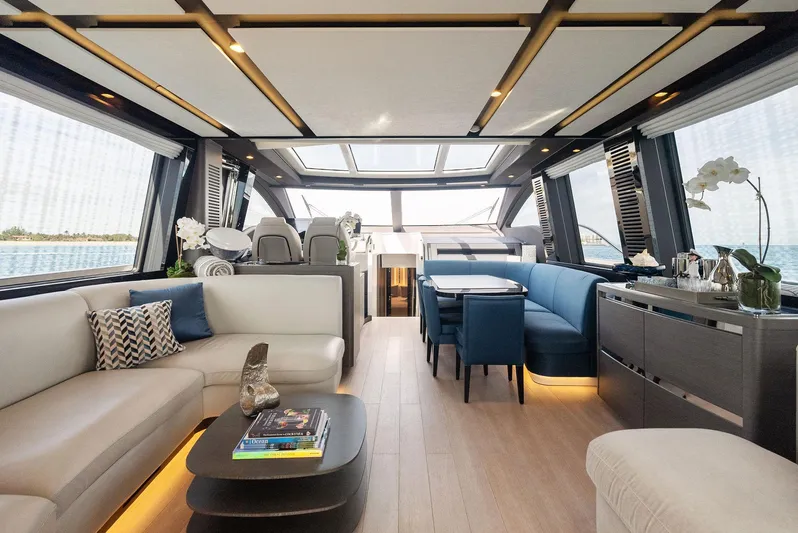 Ocean's Se7en Yacht Photos Pics Luxurious interior of 2022 Azimut S8 yacht with modern seating and elegant decor.