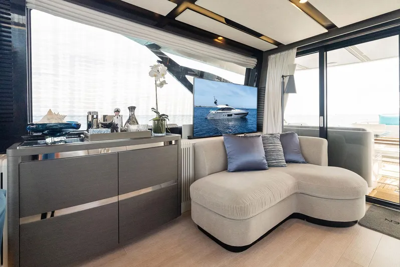Ocean's Se7en Yacht Photos Pics Luxurious interior of 2022 Azimut S8 yacht with modern decor and comfortable seating.