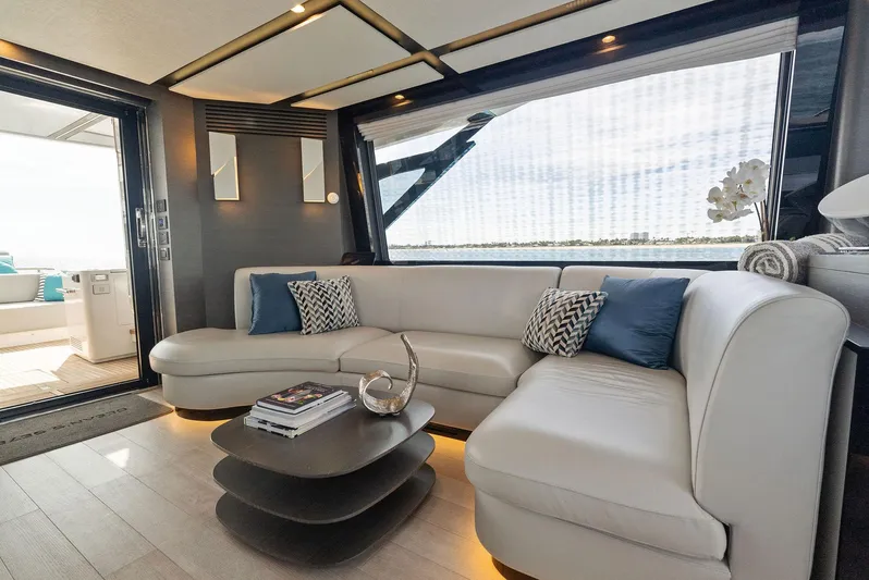 Ocean's Se7en Yacht Photos Pics Luxurious interior of 2022 Azimut S8 yacht with elegant white seating and modern decor.