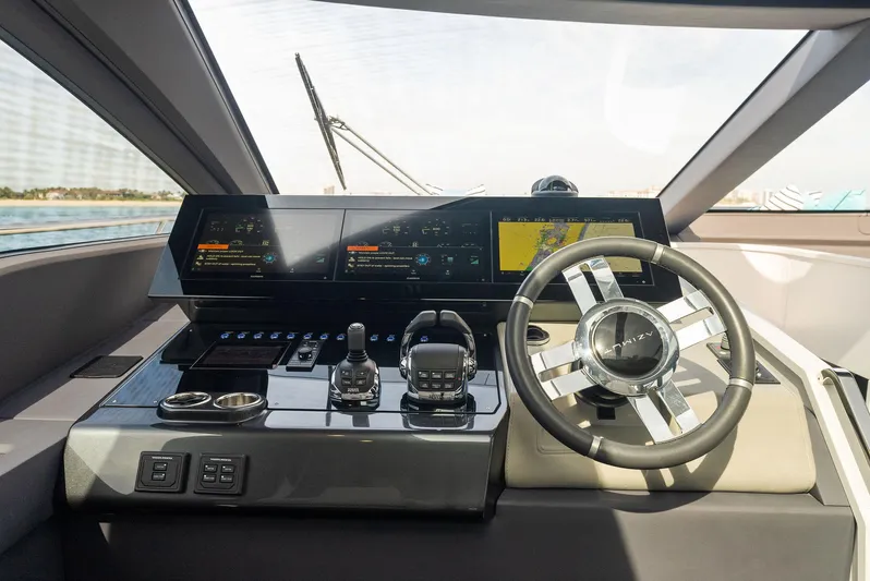 Ocean's Se7en Yacht Photos Pics 2022 Azimut S8 yacht helm with modern controls and navigation displays.