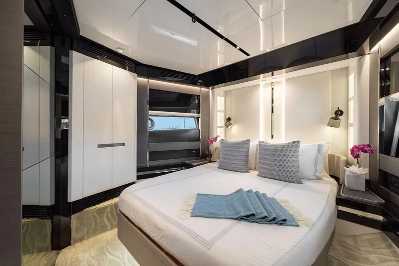 Ocean's Se7en Yacht Photos Pics Luxurious bedroom interior of 2022 Azimut S8 yacht with modern design and elegant decor.