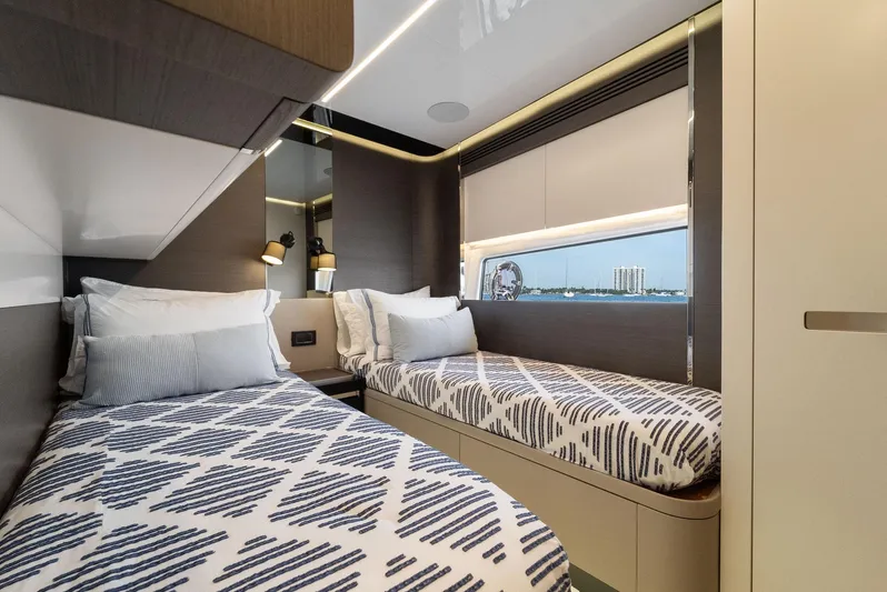 Ocean's Se7en Yacht Photos Pics Luxurious 2022 Azimut S8 yacht cabin with twin beds and modern decor.