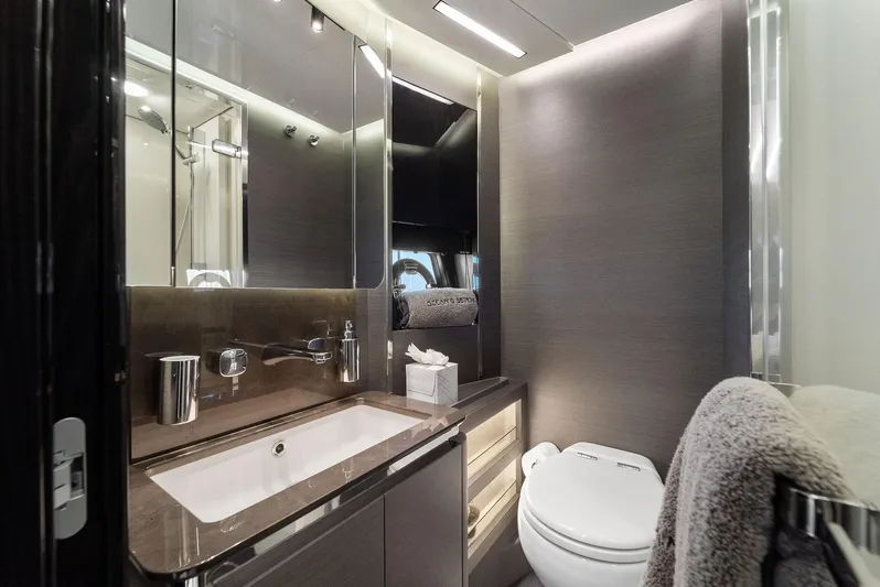 Ocean's Se7en Yacht Photos Pics Luxurious bathroom in 2022 Azimut S8 yacht with modern fixtures and elegant design.