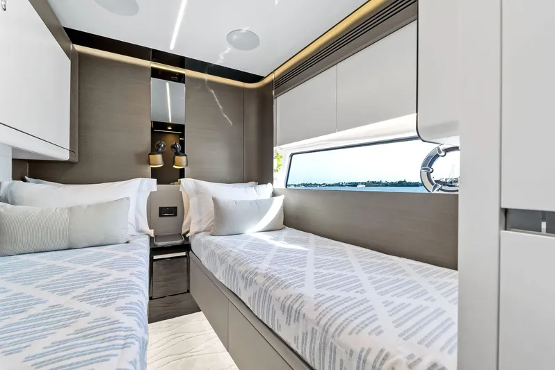 Ocean's Se7en Yacht Photos Pics Luxurious cabin interior of 2022 Azimut S8 yacht with twin beds and modern design.